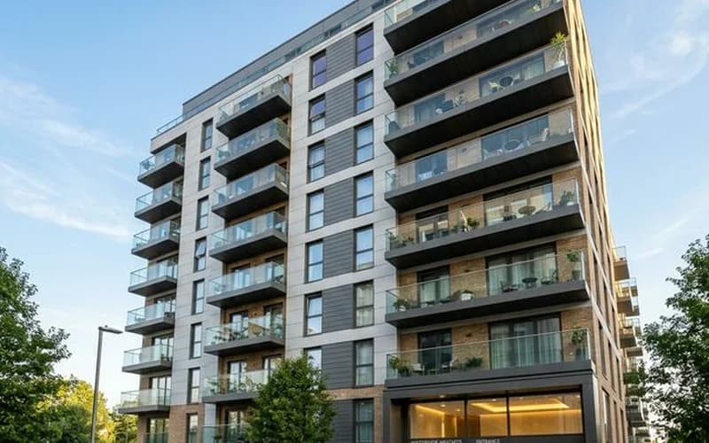 Fire door inspection for residential blocks — modern UK high-rise apartment building